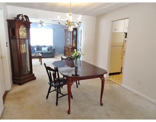 26 Raleigh Road Framingham, MA 01701 - Photo 8 of 21 a view of a dining room with furniture and a chandelier