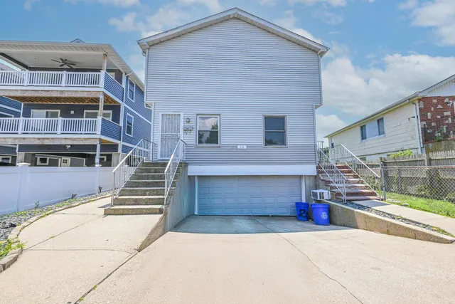 a front view of building with street