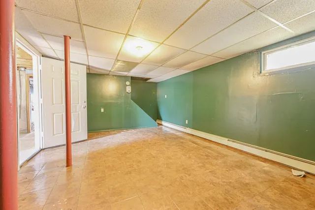 a view of empty room with windows