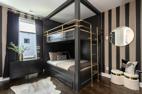 a bedroom with bed and a window