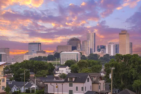 a city view with tall buildings