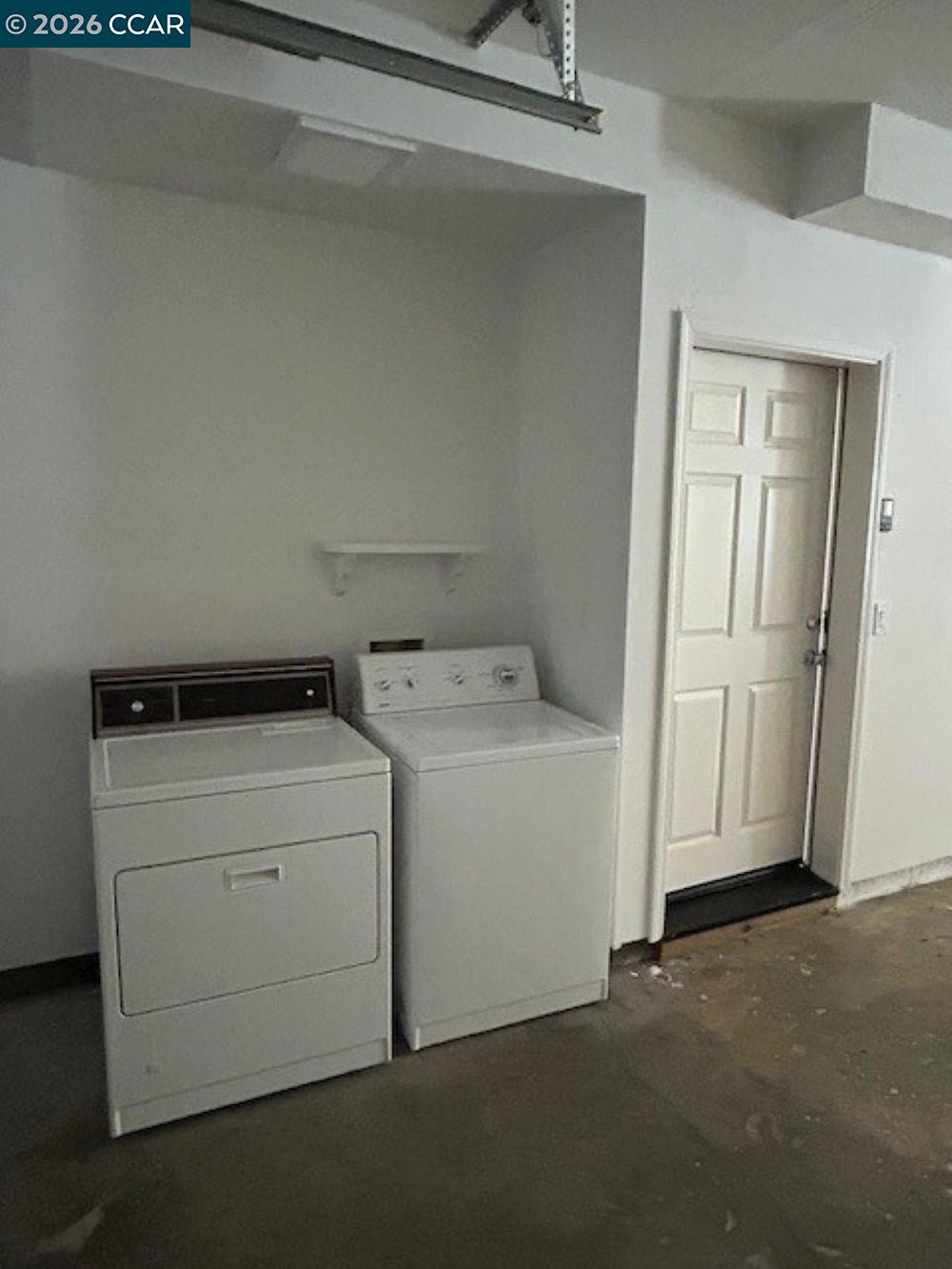 2297 Orleans Street Santa Rosa, CA 95403 - Photo 24 of 30 a utility room with dryer and washer