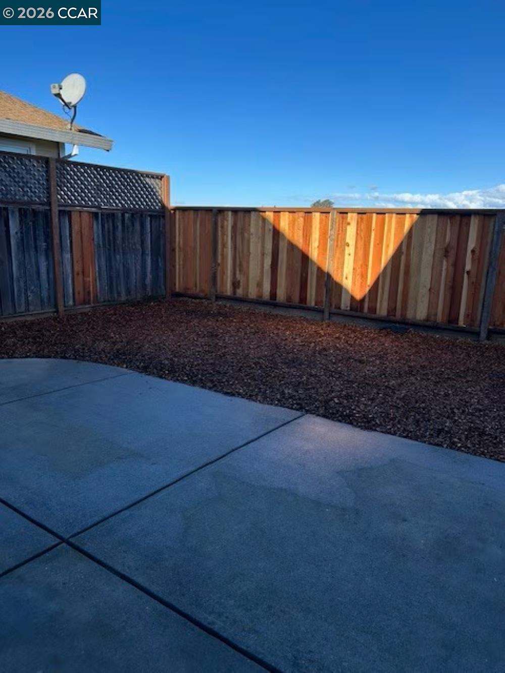 2297 Orleans Street Santa Rosa, CA 95403 - Photo 29 of 30 a view of backyard with wooden fence