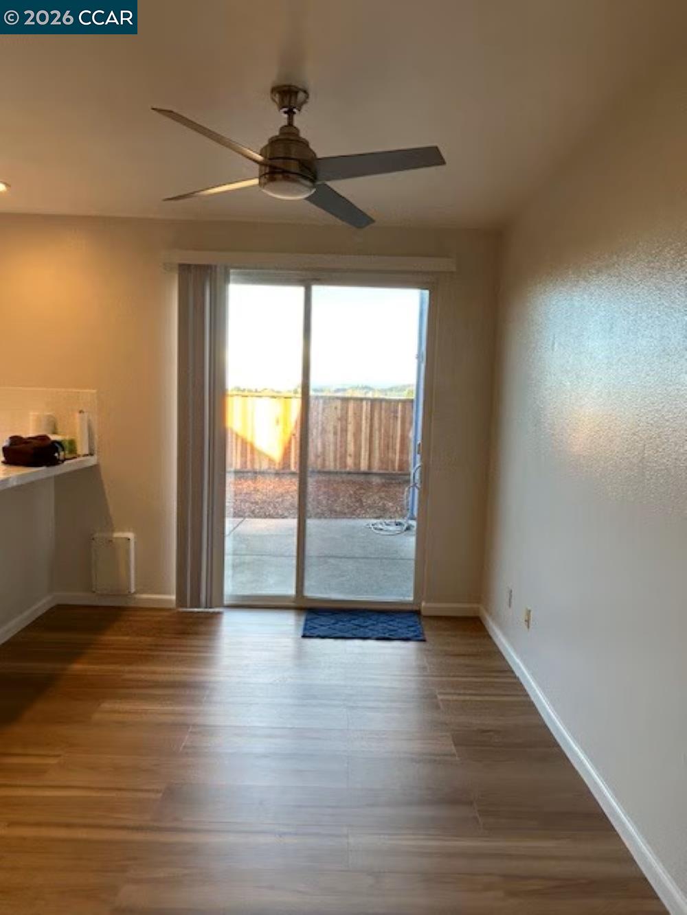2297 Orleans Street Santa Rosa, CA 95403 - Photo 7 of 30 a view of empty room with wooden floor and fan