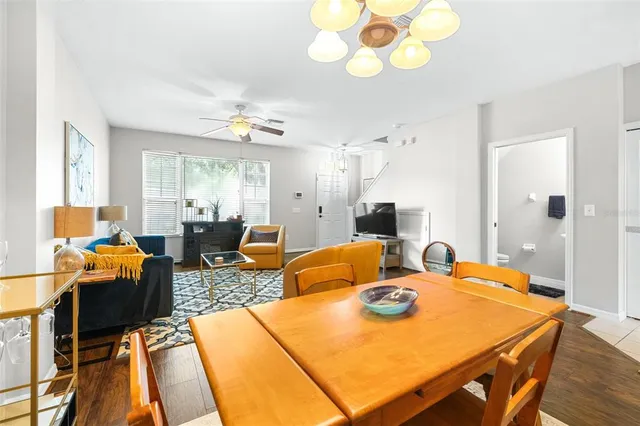 a kitchen with cabinets appliances a sink and a window