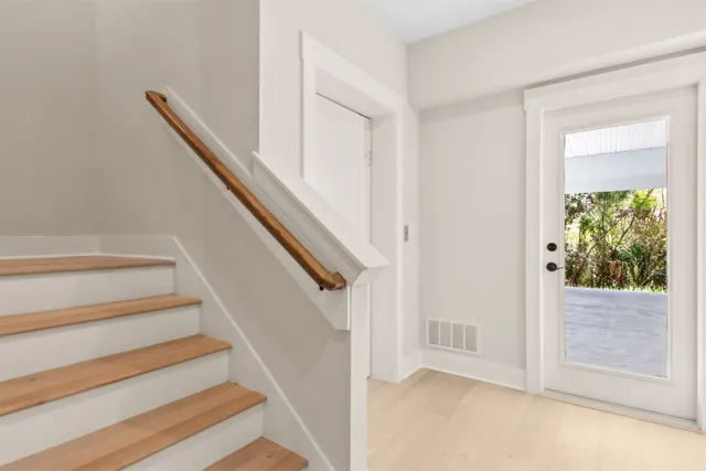 a bathroom with a sink and a window