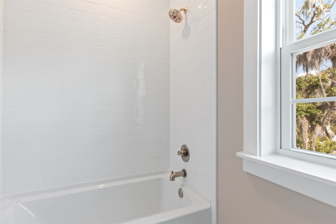 96606 Compass Point Drive Fernandina Beach, FL 32034 - Photo 36 of 88 a bathroom with a bathtub