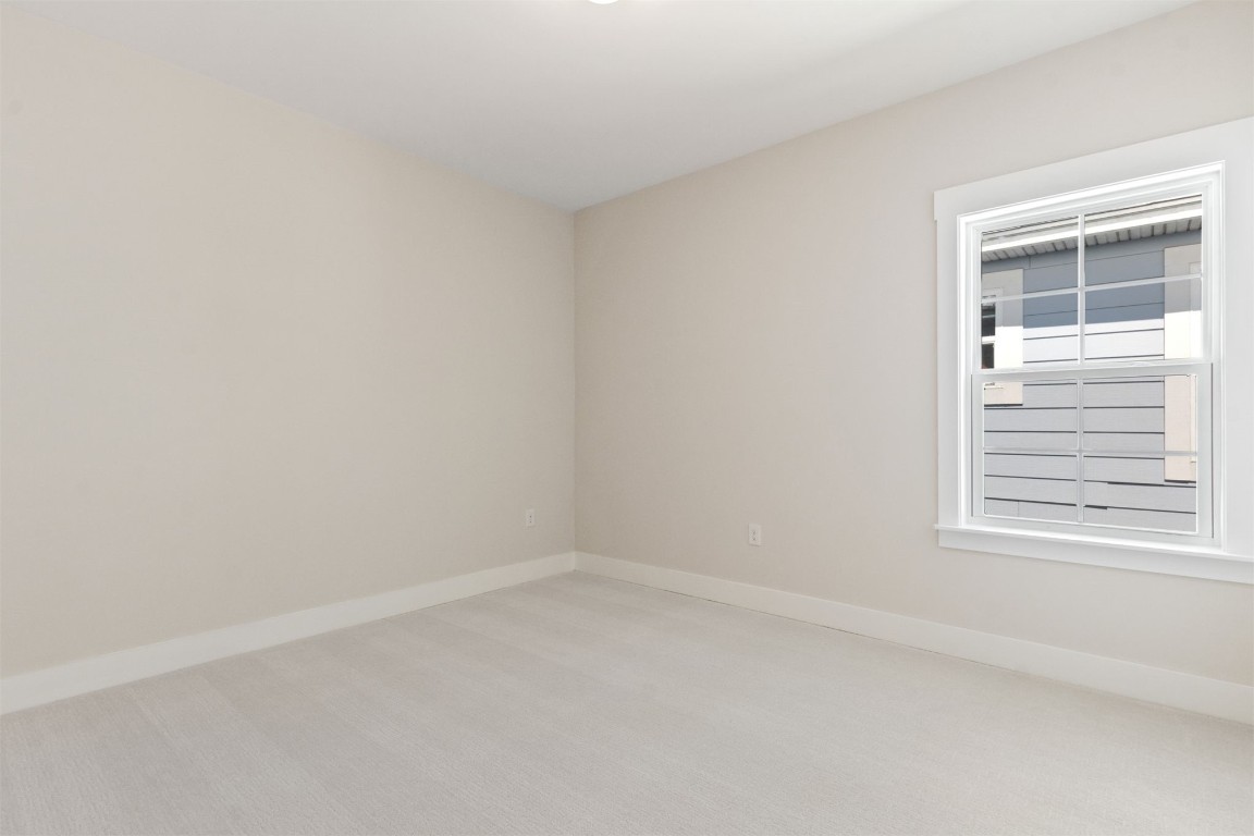 96606 Compass Point Drive Fernandina Beach, FL 32034 - Photo 37 of 88 a view of an empty room with a window