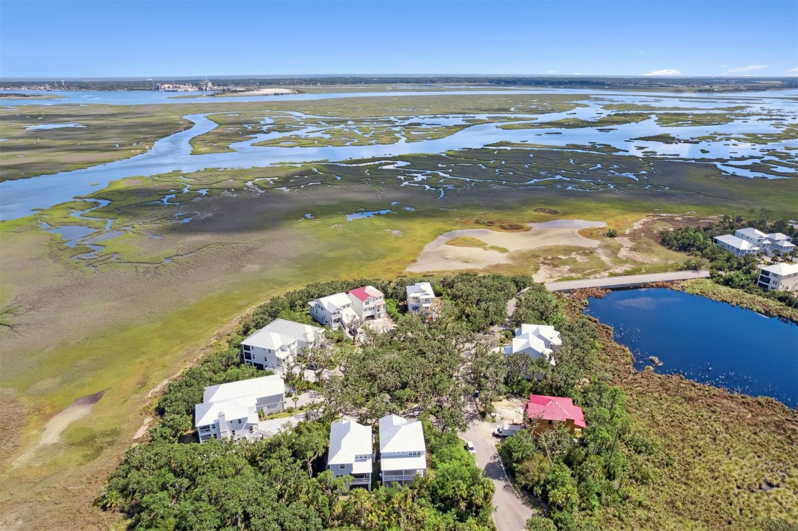 96606 Compass Point Drive Fernandina Beach, FL 32034 - Photo 55 of 88 a view of an ocean and beach