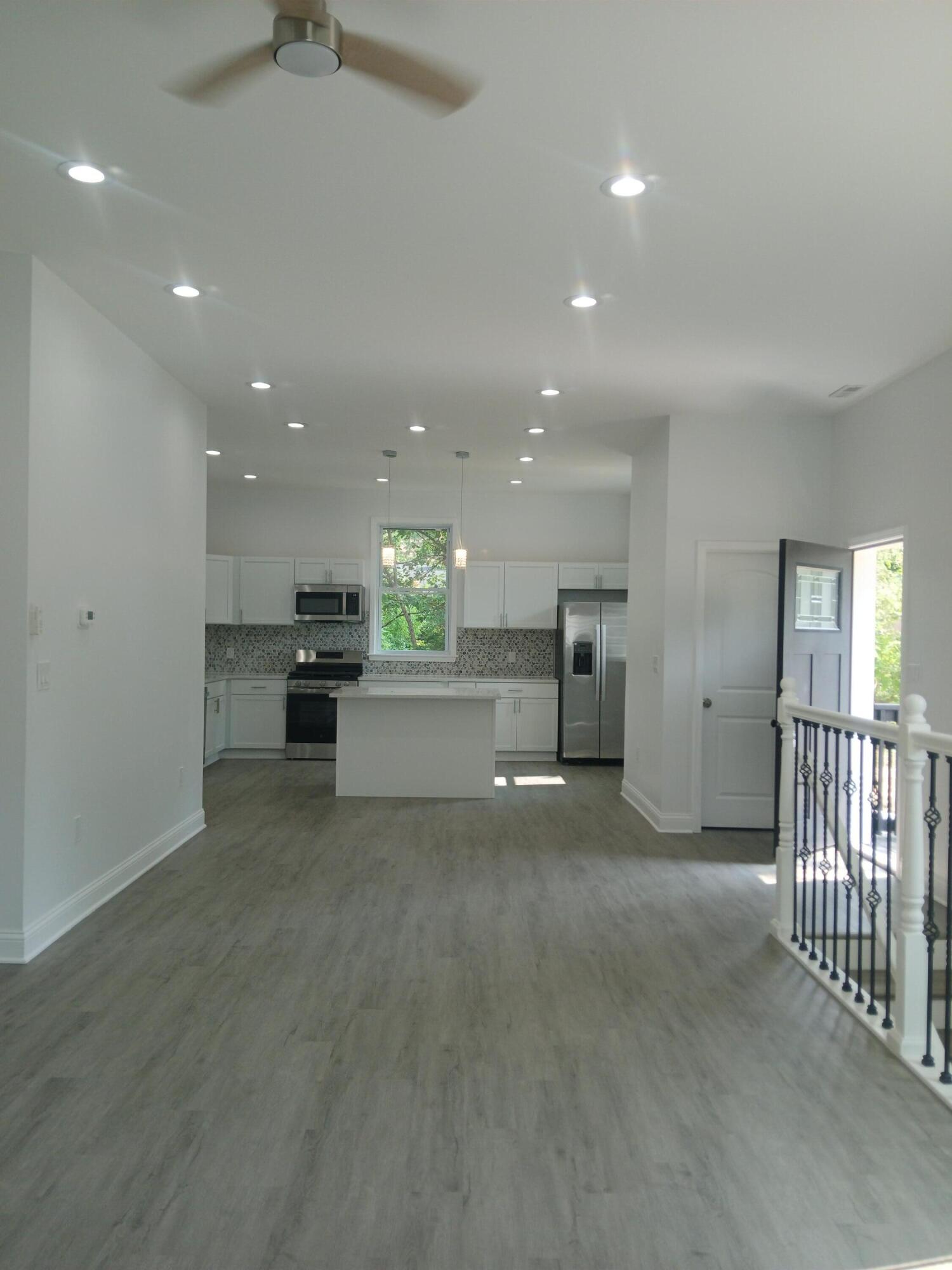 4365 Adams Street Gary, IN 46408 - Photo 18 of 68 a view of a big room with a kitchen
