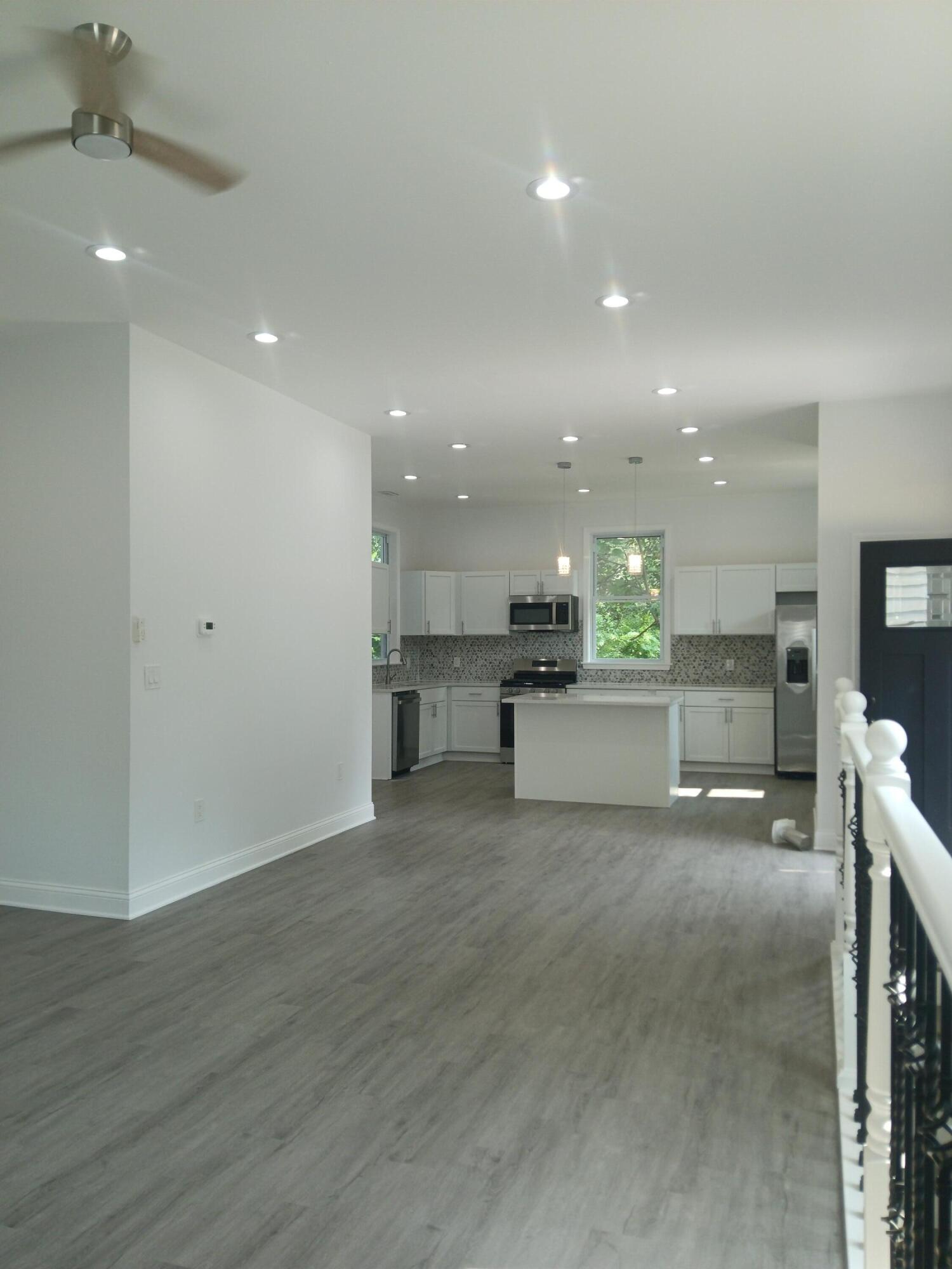 4365 Adams Street Gary, IN 46408 - Photo 20 of 68 a view of a kitchen with a sink and a microwave