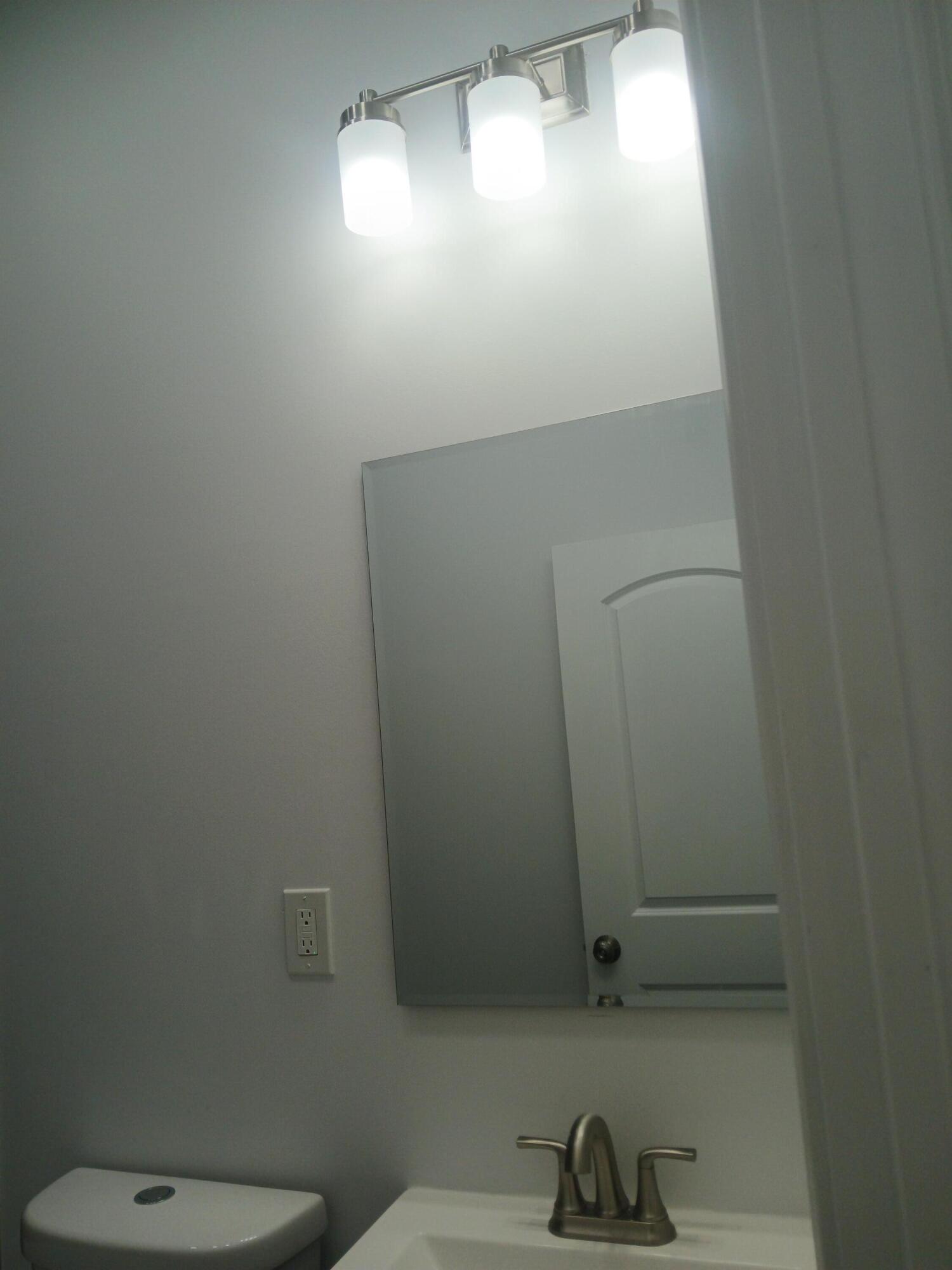 4365 Adams Street Gary, IN 46408 - Photo 33 of 68 a bathroom with a sink and toilet