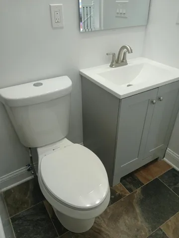 a view of a hallway with windows