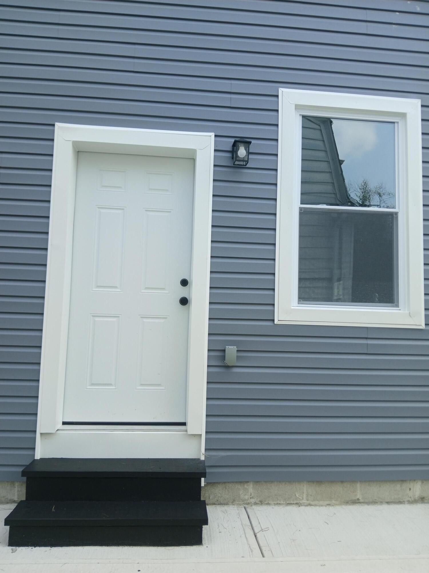 4365 Adams Street Gary, IN 46408 - Photo 63 of 68 a view of front door of a house