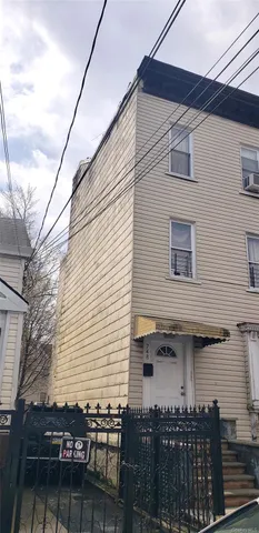 a front view of a house with balcony
