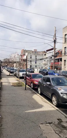 a view of parking with cars parked