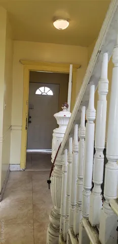 a view of entryway with a front door