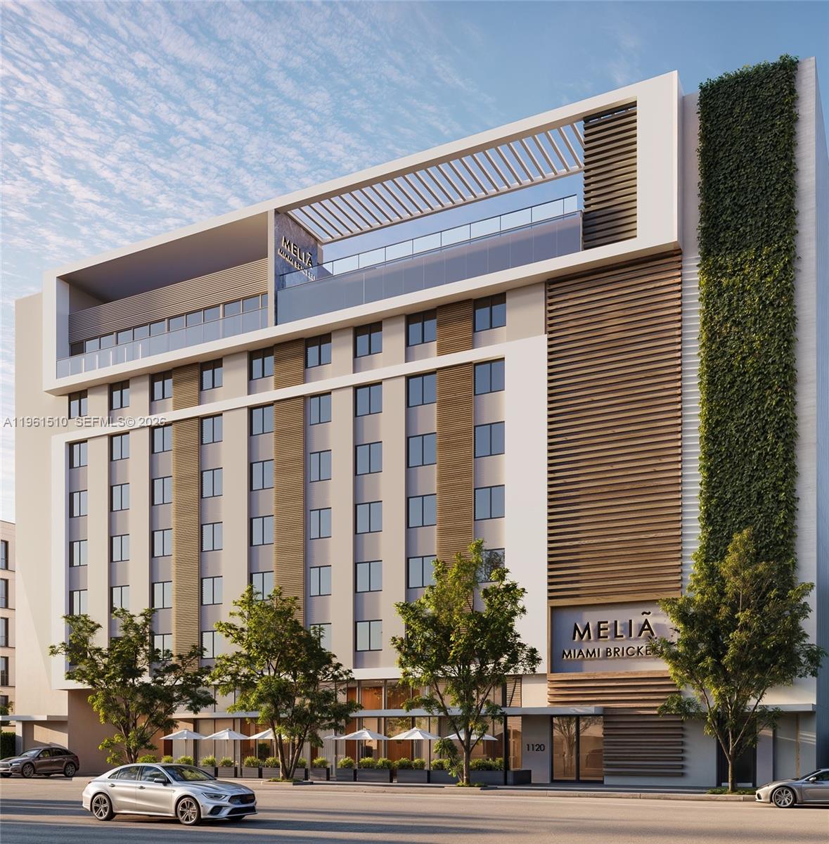 1136 Southwest 3rd Avenue, Unit 609 Miami, FL 33130 - Photo 14 of 14 a front view of a building with a garden