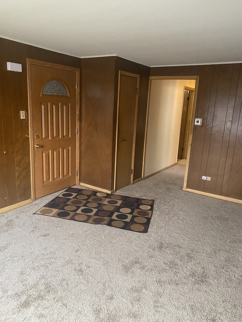 8530 South Carpenter Street, Unit 1 Chicago, IL 60620 - Photo 2 of 10 a view of livingroom with hardwood floor