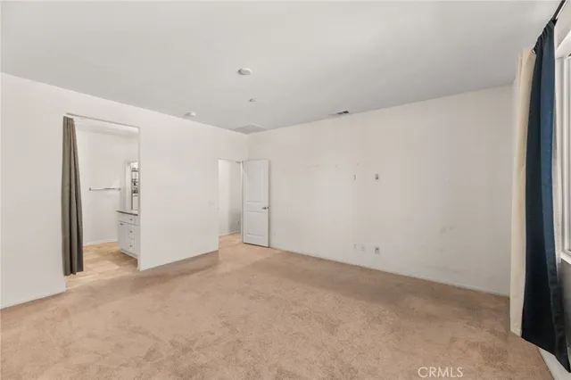 a view of a refrigerator in kitchen