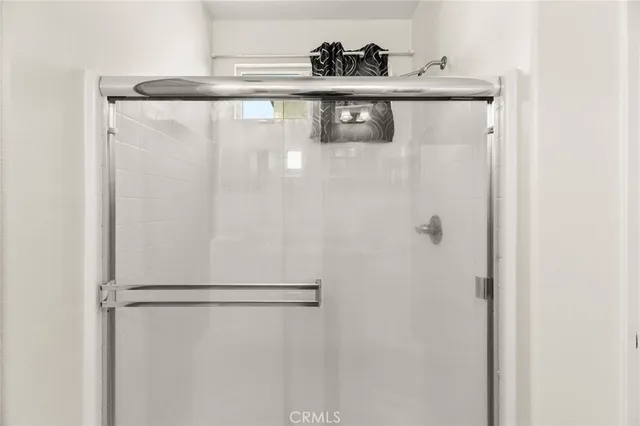 a view of a bathroom from a hallway