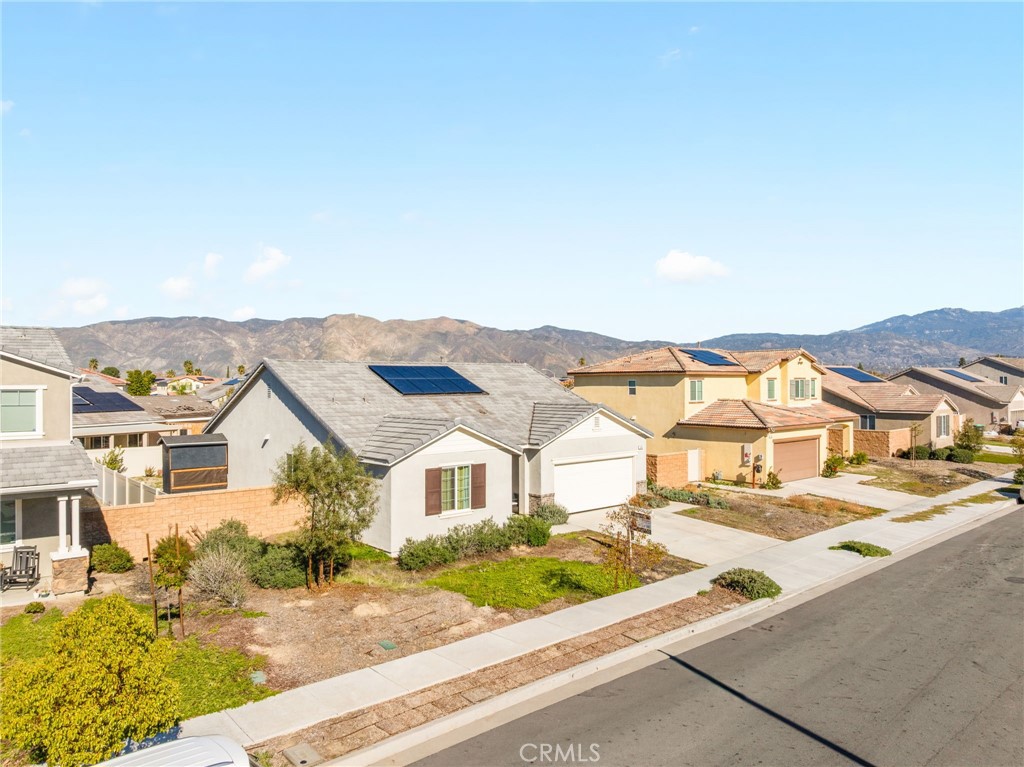 468 Bristolwood Road Hemet, CA 92543 - Photo 49 of 55 a view of a white house with a outdoor space