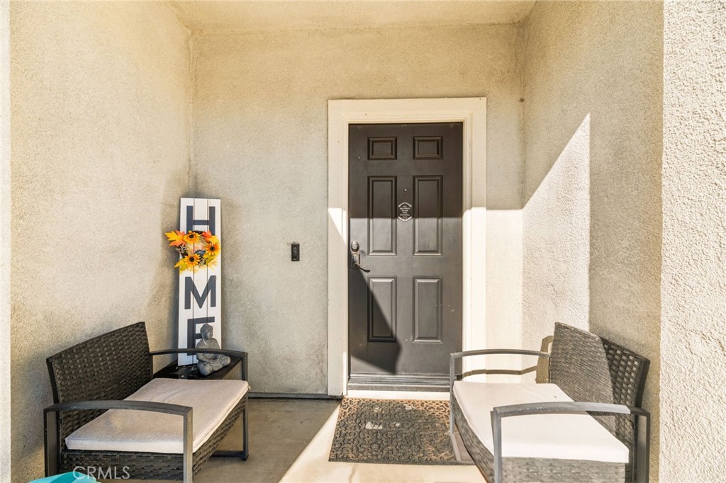 468 Bristolwood Road Hemet, CA 92543 - Photo 7 of 55 a living room with furniture and a fireplace
