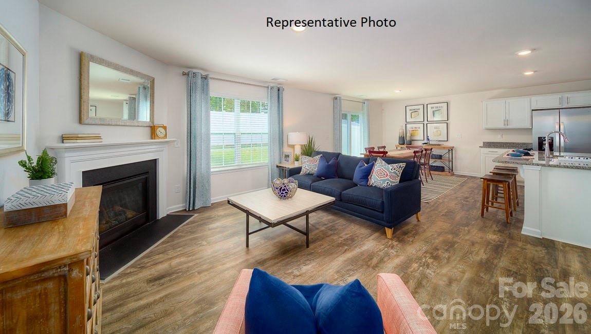 1371 Mammoth Road Hickory, NC 28602 - Photo 11 of 34 a living room with furniture fireplace and window