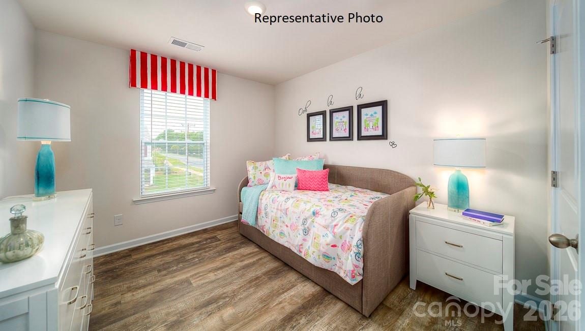 1371 Mammoth Road Hickory, NC 28602 - Photo 31 of 34 a bedroom with a bed and a window