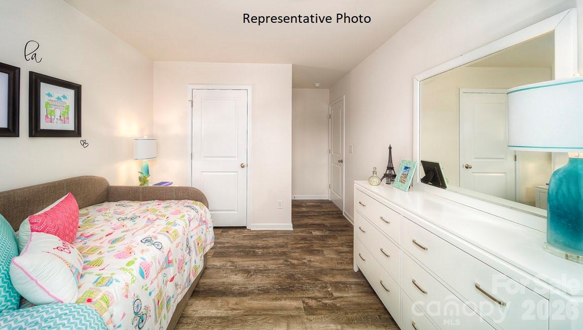 1371 Mammoth Road Hickory, NC 28602 - Photo 32 of 34 a bedroom with a bed and a lamp