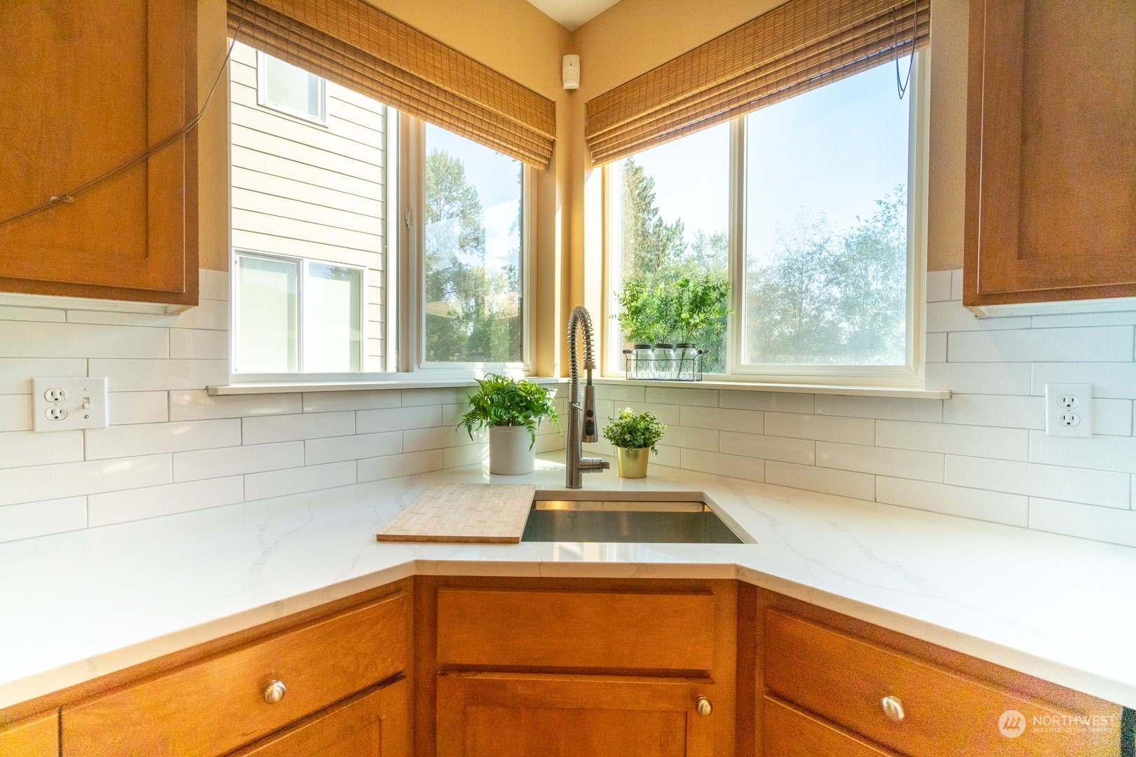 23911 22nd Avenue West Bothell, WA 98021 - Photo 12 of 27 a kitchen with a sink and a large window
