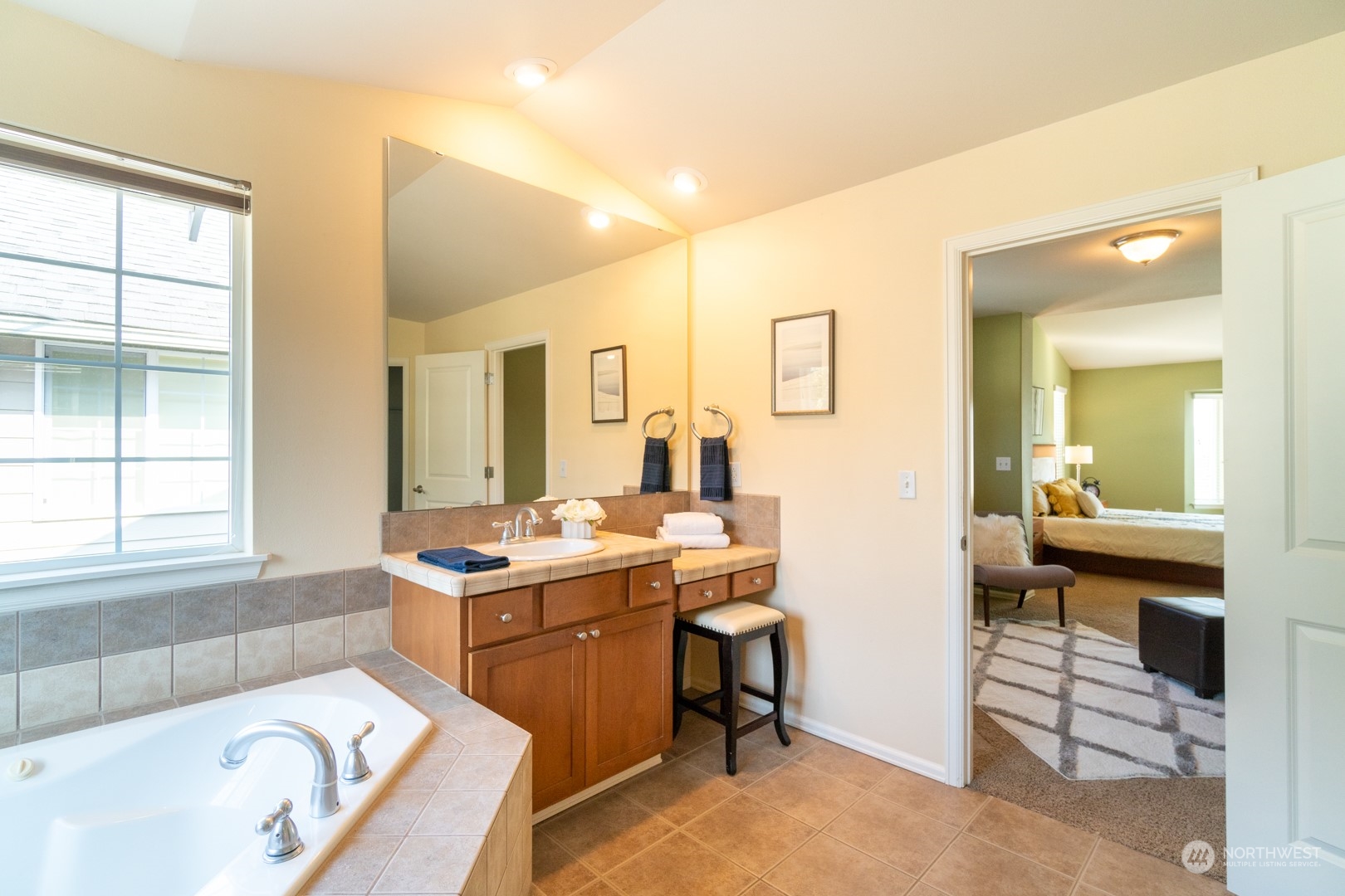 23911 22nd Avenue West Bothell, WA 98021 - Photo 20 of 27 a bathroom with a tub sink and mirror
