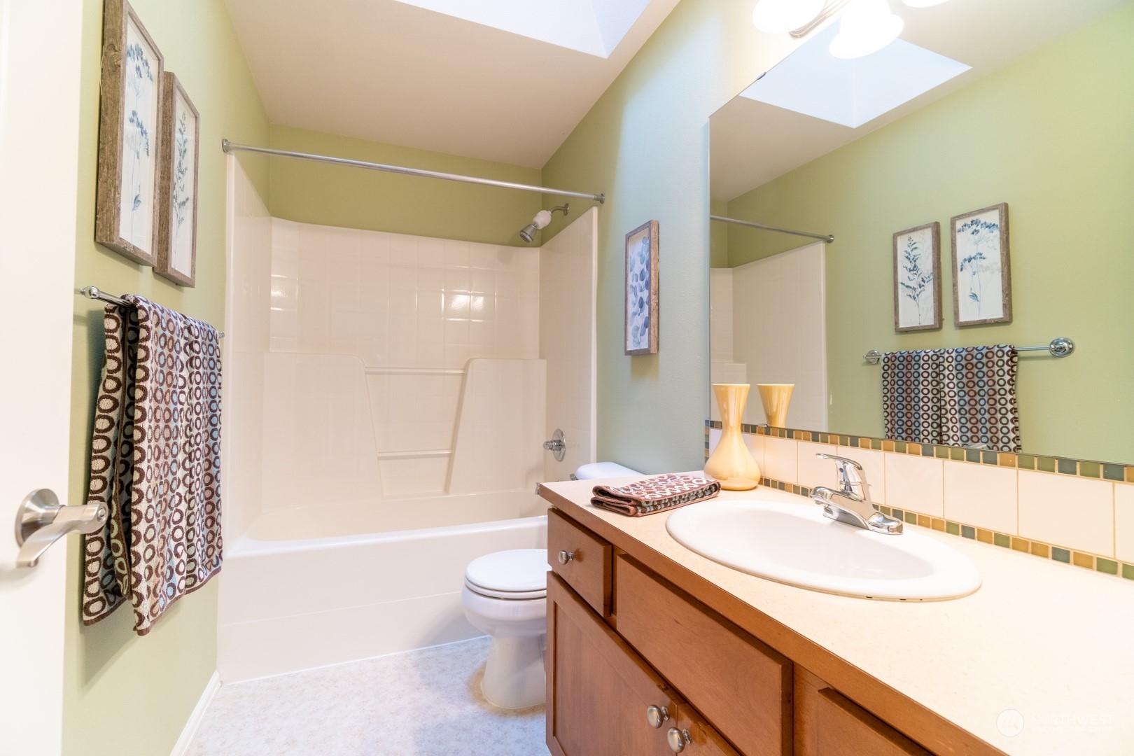 23911 22nd Avenue West Bothell, WA 98021 - Photo 27 of 27 a bathroom with a sink a toilet and shower