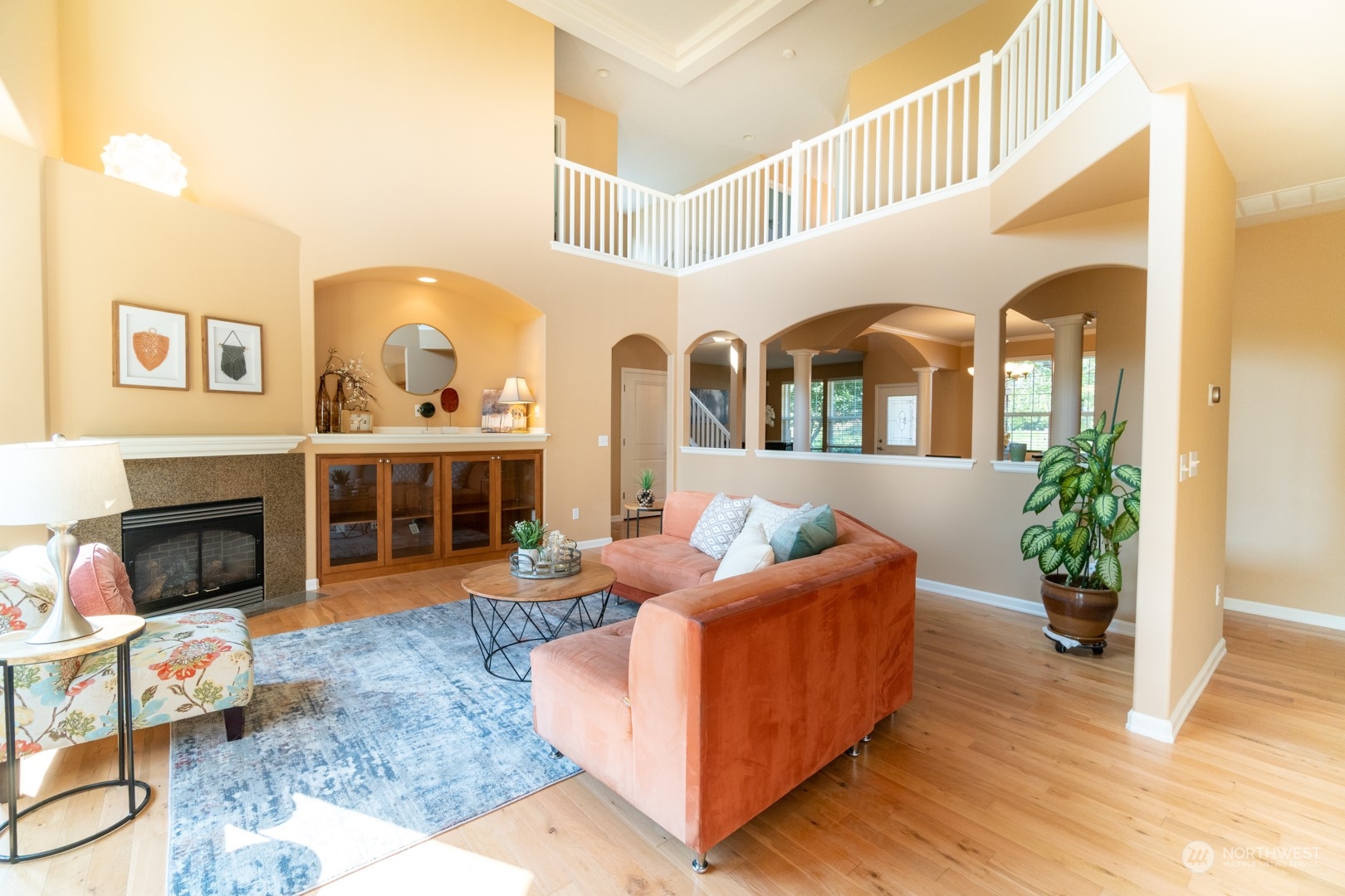 23911 22nd Avenue West Bothell, WA 98021 - Photo 7 of 27 a living room with furniture and a fireplace