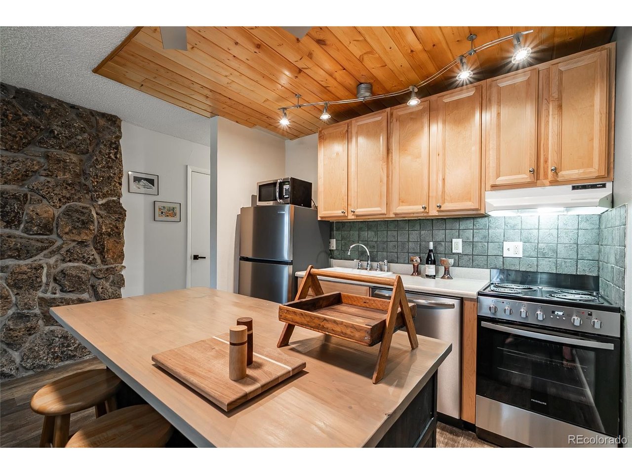400 Hi Country Drive, Unit 15 Winter Park, CO 80482 - Photo 5 of 35 A well planned kitchen with prep space and new appliances