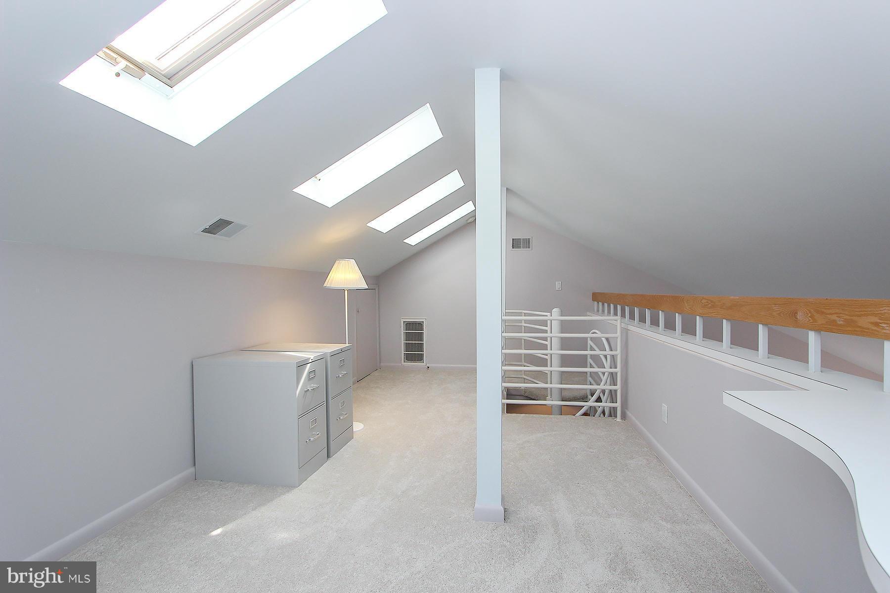 8536 West Howell Road Bethesda, MD 20817 - Photo 19 of 29 Loft space above Master with built-in desk