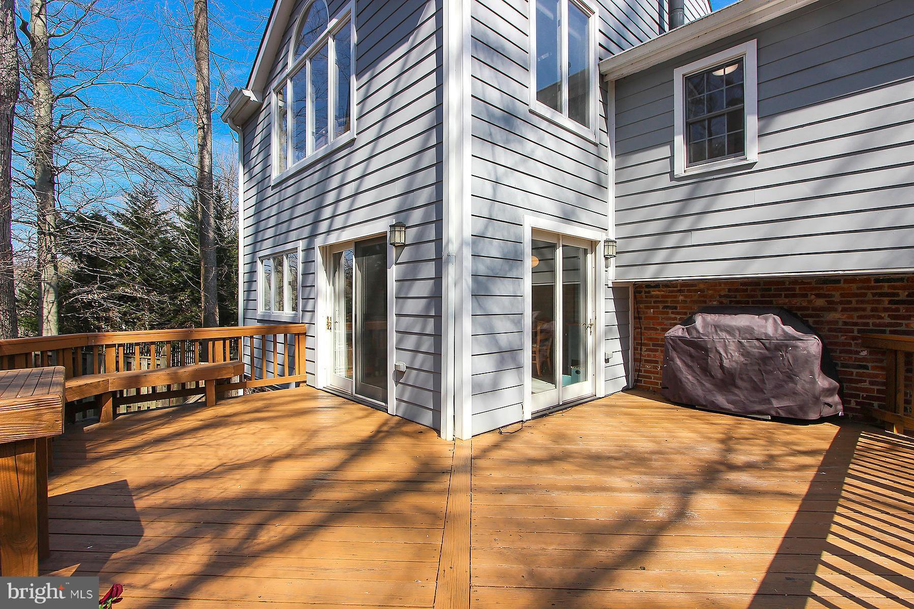 8536 West Howell Road Bethesda, MD 20817 - Photo 25 of 29 Deck with dual access to the Kitchen