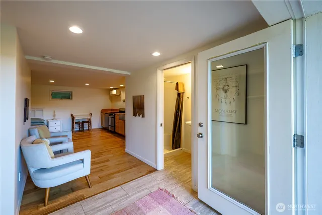 a view of a living room and dining room