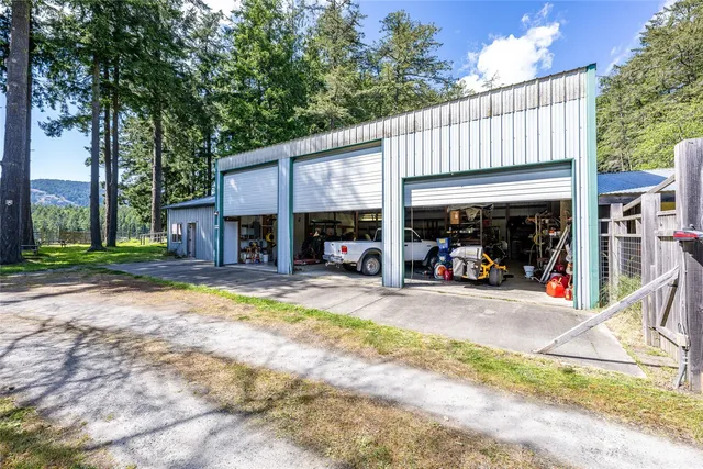 a view of a car park in front of retail shop