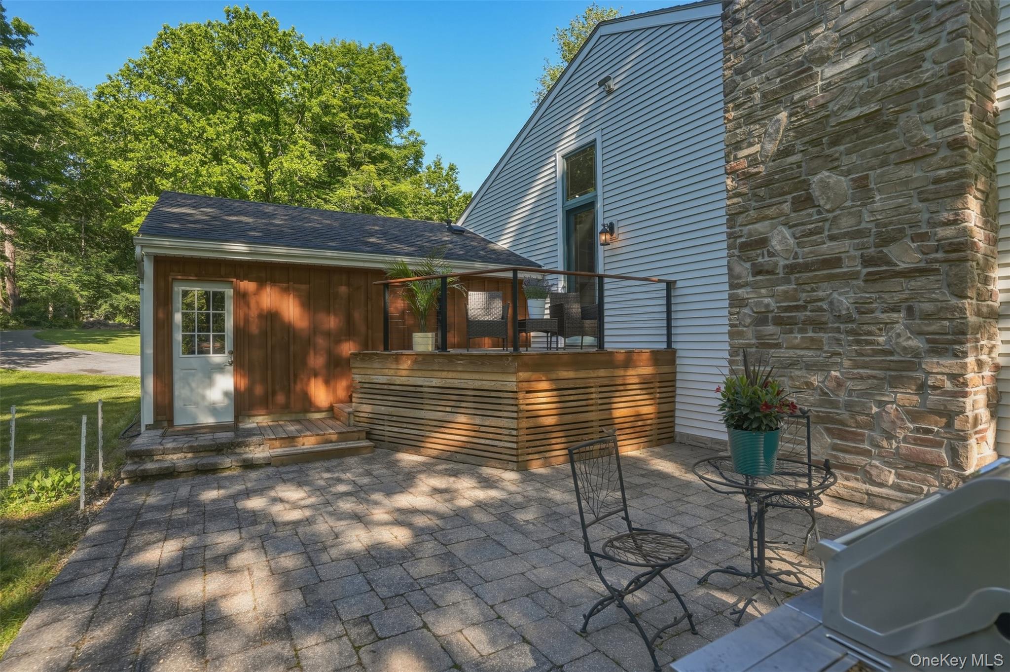 97 Walling Road Warwick, NY 10990 - Photo 28 of 43 Patio area leading to garage backdoor.