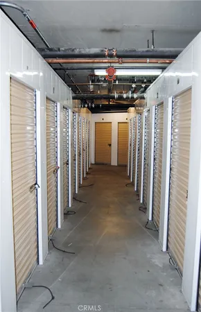 a view of a hallway with stairs