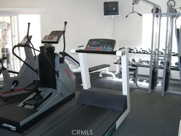 a view of a room with gym equipment