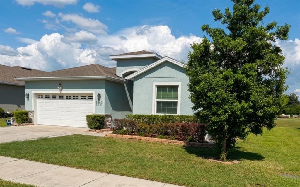 5703 Southwest 50th Avenue Ocala, FL 34474 - Photo 3 of 3 a view of a house with a yard