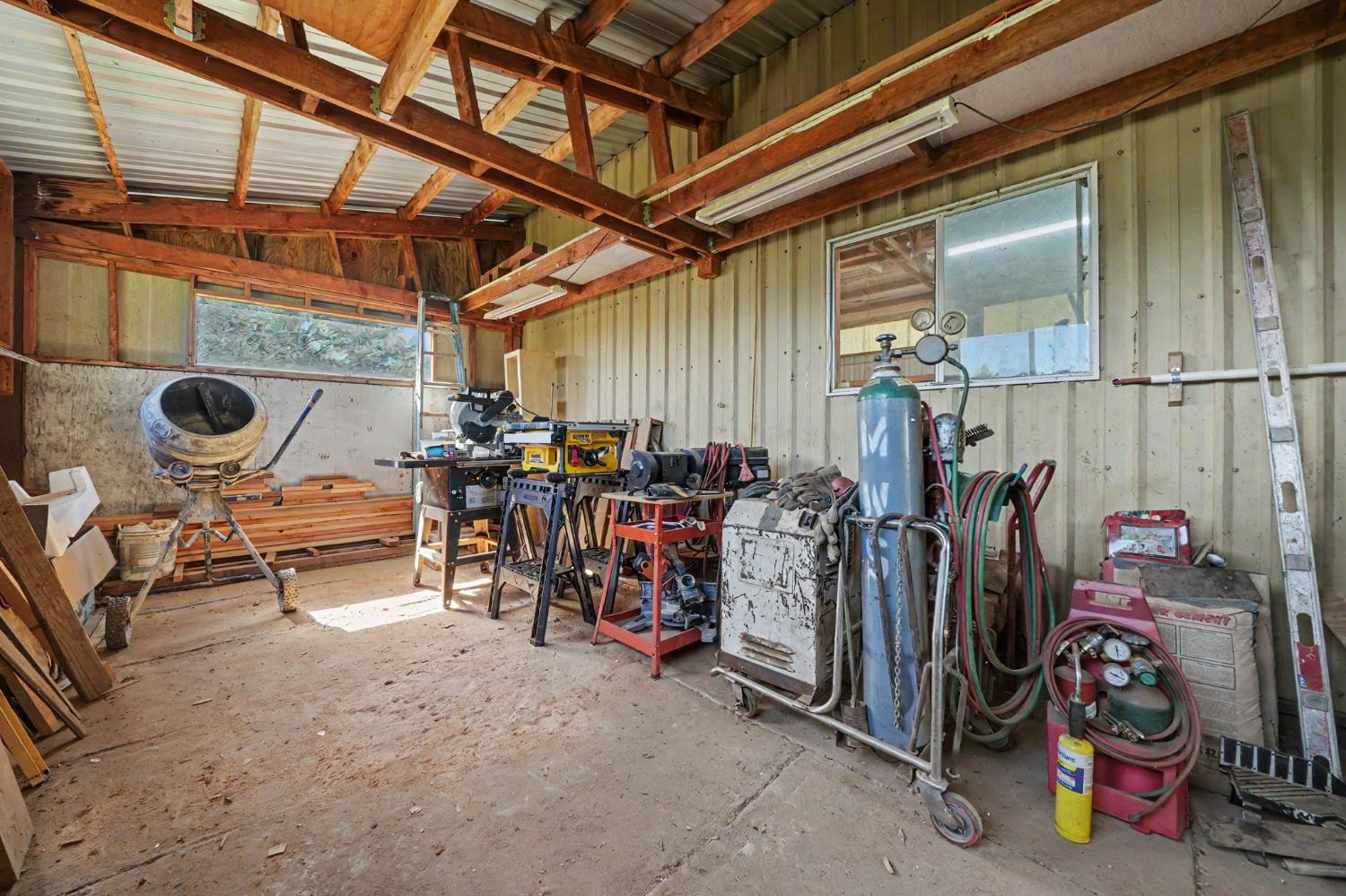 17800 Red Mule Road Fiddletown, CA 95629 - Photo 34 of 74 Side workshop off of large workshop