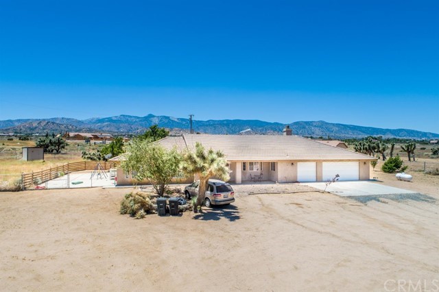 9420 Paramount Road Phelan, CA 92371 - Photo 1 of 1 a view of swimming pool with outdoor seating and city view