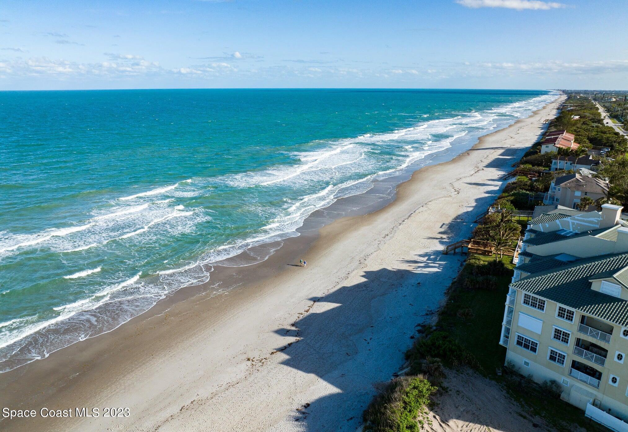 245 Richards Road Melbourne Beach, FL 32951 - Photo 17 of 18 a view of an ocean and beach