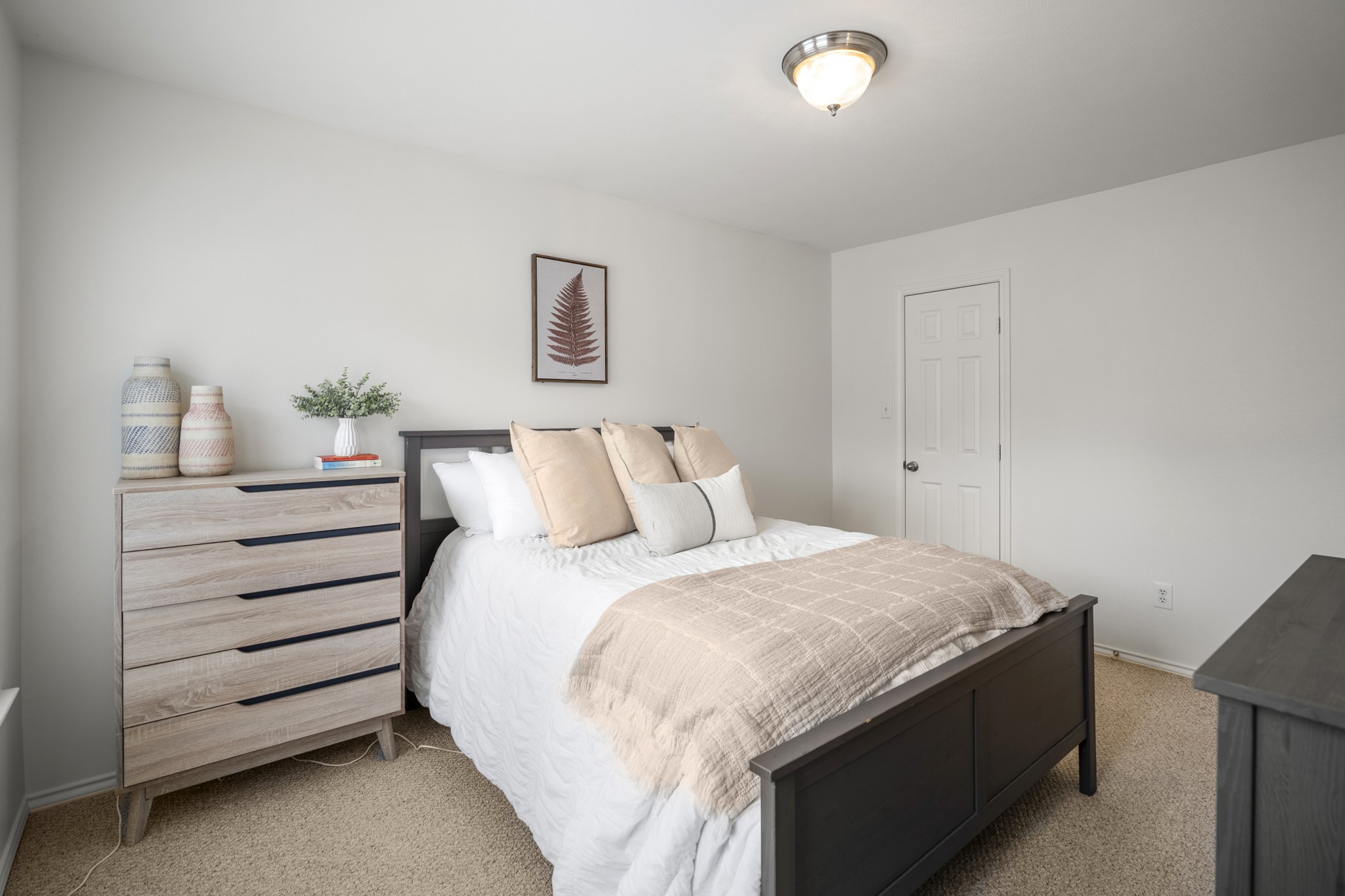 3209 Chenevert Street Houston, TX 77004 - Photo 17 of 32 Comfortable secondary bedroom located on the second floor ideal for guests, a home office, or flex space.