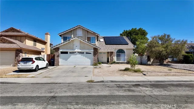 a view of a house with a street view