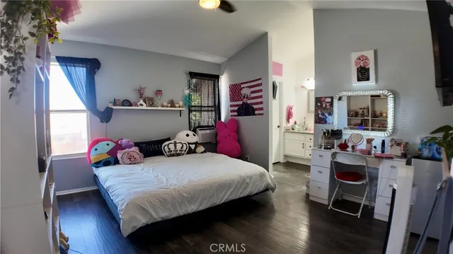 a view of a livingroom with closet and workspace