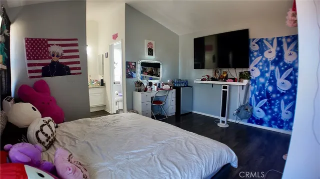 a bathroom with a sink vanity and a mirror